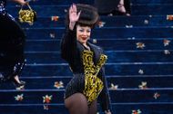 Doja Cat in a pinstripe bodysuit at The 2025 Met Gala (Image via Getty)